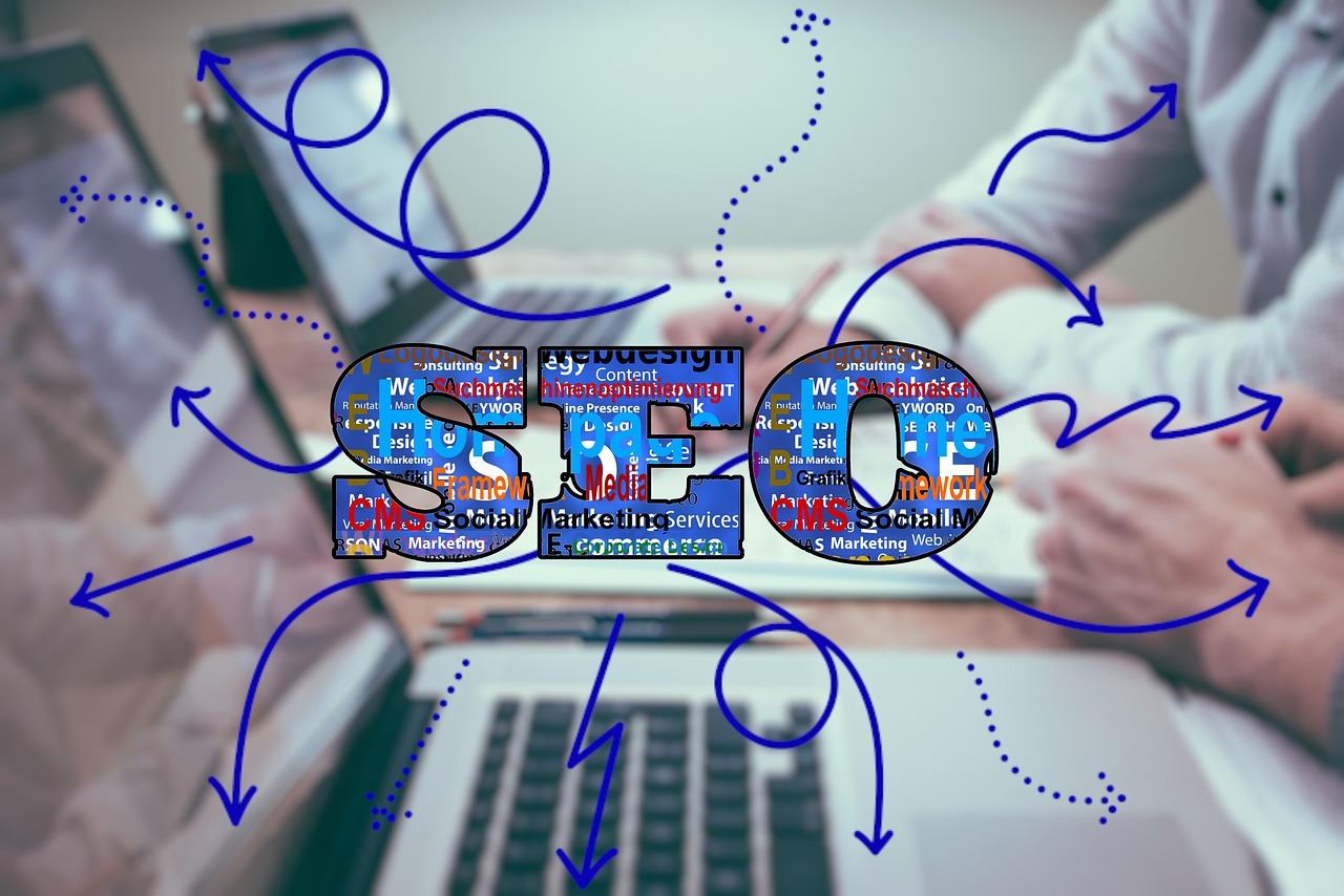 The letters SEO over an image of a laptop and hands on the keyboard. Blue arrows coming from different parts of the letters for the SEO Dating Challenge